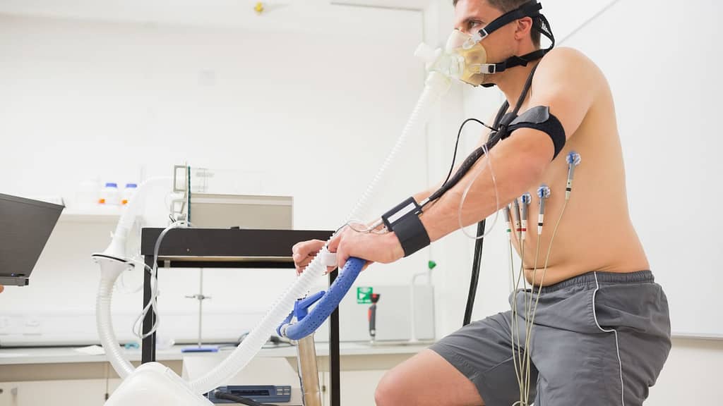 Patient performing cardiac stress test on treadmill for 93017 CPT code interpretation and cardiovascular billing